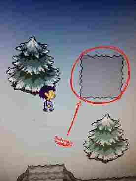 Switch hidden in a small patch of snow between some pine trees.